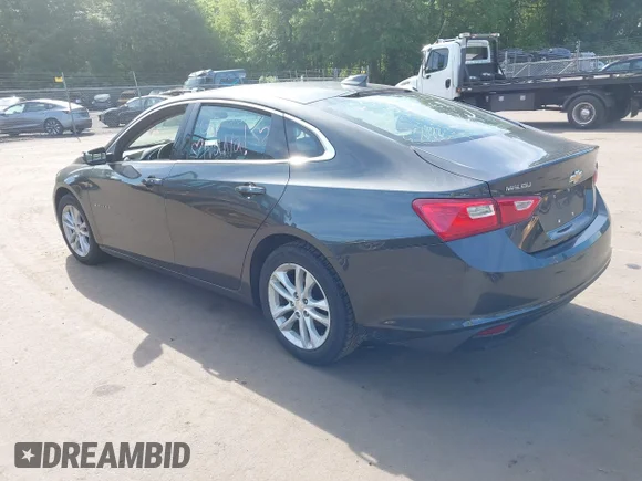 ✅ 2016 Chevrolet Malibu LT • VIN: 1G1ZE5ST2GF260641 • Lot: 45467128. Listed on IAAI with 167,530 mi. Free auction sales archive from the USA and detailed vehicle history report at DreamBid. Image 3.