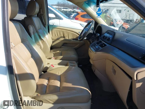 ✅ 2010 Honda Odyssey EX-L • VIN: 5FNRL3H67AB097550 • Lot: 44398206. Listed on IAAI with 198,503 mi. Free auction sales archive from the USA and detailed vehicle history report at DreamBid. Image 5.