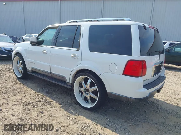 ✅ 2003 Lincoln Navigator Ultimate • VIN: 5LMFU27R63LJ14319 • Lot: 42588725. Listed on IAAI with 242,728 mi. Free auction sales archive from the USA and detailed vehicle history report at DreamBid. Image 3.