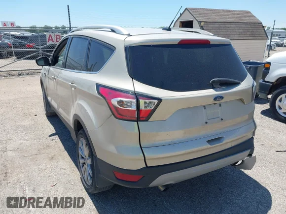 ✅ 2017 Ford Escape Titanium • VIN: 1FMCU9J95HUE66266 • Lot: 45279114. Wystawiony na IAAI z przebiegiem 158 525 mil. Bezpłatny archiwum sprzedaży aukcyjnych z USA i szczegółowy raport historii pojazdu na DreamBid. Zdjęcie 3.