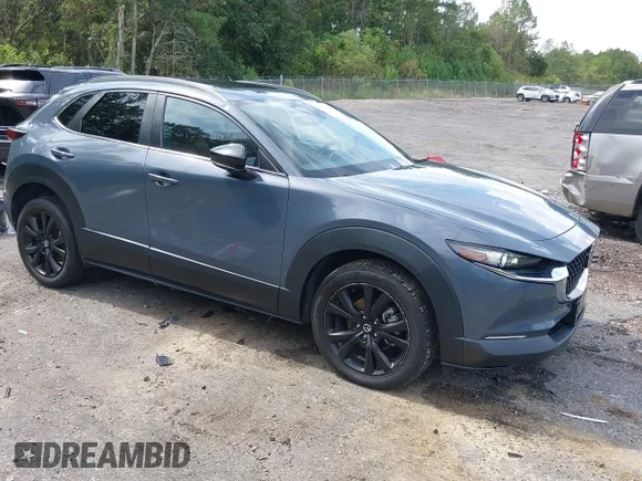 ✅ 2023 Mazda CX-30 S Preferred • VIN: 3MVDMBCM2PM530055 • Лот: 43399749. Опубліковано раніше на IAAI з пробігом 40 558 миль. Безкоштовний доступ до архіву аукціонних продажів зі США та докладний звіт про історію автомобіля на DreamBid. Зображення 1.