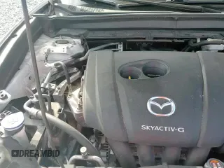 ✅ 2020 Mazda CX-30 Select • VIN: 3MVDMBCL6LM117492 • Лот: 91071765. Опубликован ранее на Copart с пробегом 99 754 миль. Бесплатный доступ к архиву аукционных продаж из США и подробный отчёт об истории автомобиля на DreamBid. Изображение 13.