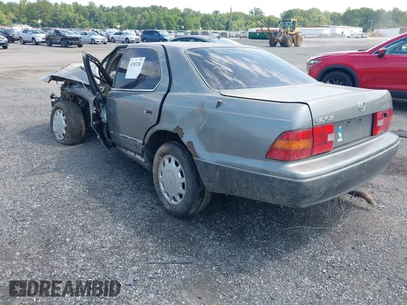 ✅ 1995 Lexus LS 400 • VIN: JT8UF22EXS0023985 • Lot: 42987282. Wystawiony na IAAI z przebiegiem 240 000 mil. Bezpłatny archiwum sprzedaży aukcyjnych z USA i szczegółowy raport historii pojazdu na DreamBid. Zdjęcie 3.