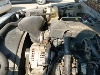 ✅ 2000 GMC Sierra 1500 SL • VIN: 1GTEK14V5YE412781 • Лот: 42486618. Опубликован ранее на IAAI с пробегом 248 167 миль. Бесплатный доступ к архиву аукционных продаж из США и подробный отчёт об истории автомобиля на DreamBid. Изображение 13.