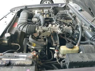 ✅ 1995 Ford Ranger Splash • VIN: 1FTCR14U6SPB15010 • Lot: 42499857. Wystawiony na IAAI z przebiegiem 102 751 mil. Bezpłatny archiwum sprzedaży aukcyjnych z USA i szczegółowy raport historii pojazdu na DreamBid. Zdjęcie 19.