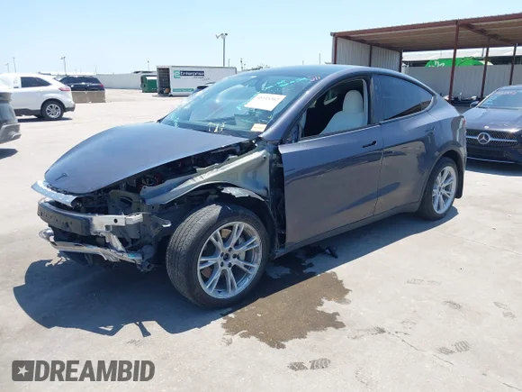 ✅ 2023 Tesla Model Y Long Range • VIN: 7SAYGDEE6PF839675 • Lot: 45115302. Wystawiony na IAAI z przebiegiem 36 978 mil. Bezpłatny archiwum sprzedaży aukcyjnych z USA i szczegółowy raport historii pojazdu na DreamBid. Zdjęcie 2.
