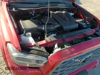 ✅ 2022 Toyota Tacoma TRD Sport • VIN: 3TYRZ5CNXNT023683 • Лот: 94000015. Опубликован ранее на Copart с пробегом 28 418 миль. Бесплатный доступ к архиву аукционных продаж из США и подробный отчёт об истории автомобиля на DreamBid. Изображение 13.