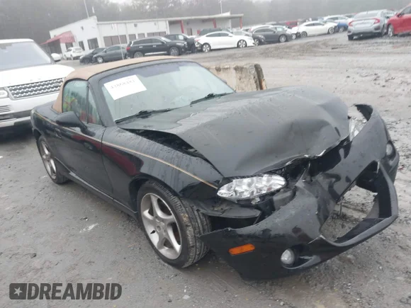 ✅ 2002 Mazda MX-5 Miata Cloth • VIN: JM1NB353120221906 • Lot: 43868481. Listed on IAAI with 99,471 mi. Free auction sales archive from the USA and detailed vehicle history report at DreamBid. Image 1.