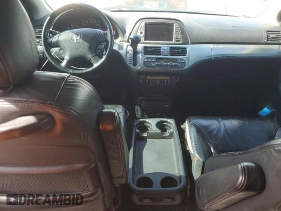 ✅ 2005 Honda Odyssey Touring • VIN: 5FNRL38855B055739 • Lot: 76560835. Wystawiony na Copart z przebiegiem 238 216 mil. Bezpłatny archiwum sprzedaży aukcyjnych z USA i szczegółowy raport historii pojazdu na DreamBid. Zdjęcie 8.