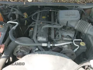 ✅ 1999 Jeep Grand Cherokee Laredo • VIN: 1J4GW58S3XC577091 • Lot: 42398194. Listed on IAAI with 270,812 mi. Free auction sales archive from the USA and detailed vehicle history report at DreamBid. Image 12.