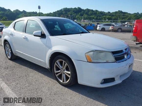 ✅ 2012 Dodge Avenger SXT Plus • VIN: 1C3CDZEGXCN269467 • Lot: 42678187. Listed on IAAI with 199,952 mi. Free auction sales archive from the USA and detailed vehicle history report at DreamBid. Image 1.