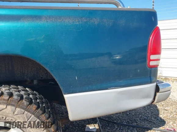 ✅ 1999 Dodge Dakota SLT • VIN: 1B7GL22Y6XS156448 • Lot: 44143533. Wystawiony na IAAI z przebiegiem 62 728 mil. Bezpłatny archiwum sprzedaży aukcyjnych z USA i szczegółowy raport historii pojazdu na DreamBid. Zdjęcie 6.