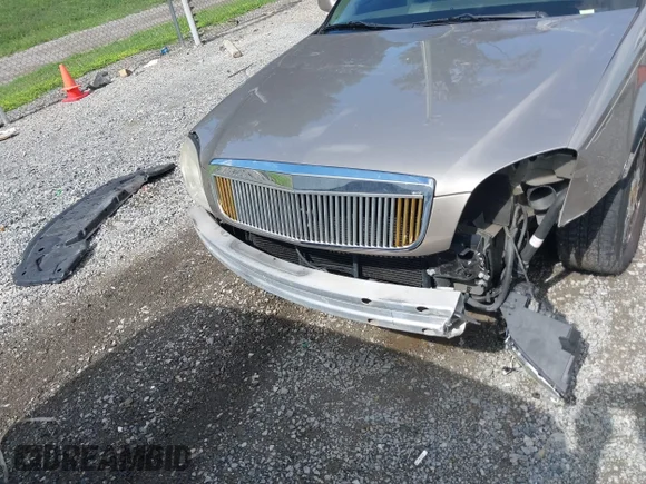 ✅ 2003 Cadillac DeVille DHS • VIN: 1G6KE57Y93U107485 • Lot: 42995640. Wystawiony na IAAI z przebiegiem 118 574 mil. Bezpłatny archiwum sprzedaży aukcyjnych z USA i szczegółowy raport historii pojazdu na DreamBid. Zdjęcie 6.