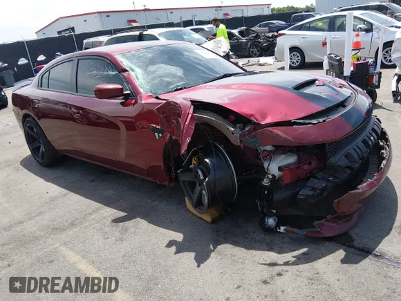 ✅ 2019 Dodge Charger R/T • VIN: 2C3CDXCT7KH737943 • Lot: 45065526. Listed on IAAI with 89,809 mi. Free auction sales archive from the USA and detailed vehicle history report at DreamBid. Image 1.
