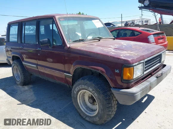 ✅ 1991 Isuzu Trooper • VIN: JACCH58R8M7904079 • Lot: 42303036. Wystawiony na IAAI z przebiegiem 244 672 mil. Bezpłatny archiwum sprzedaży aukcyjnych z USA i szczegółowy raport historii pojazdu na DreamBid. Zdjęcie 1.