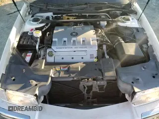 ✅ 2002 Cadillac Eldorado ESC • VIN: 1G6EL12Y12B100821 • Лот: 83495214. Опубликован ранее на Copart с пробегом 36 358 миль. Бесплатный доступ к архиву аукционных продаж из США и подробный отчёт об истории автомобиля на DreamBid. Изображение 13.