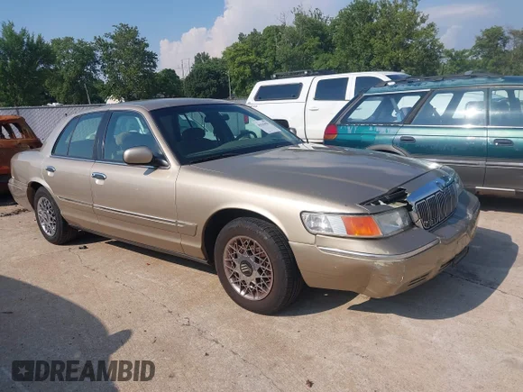 ✅ 2000 Mercury Grand Marquis GS • VIN: 2MEFM74W1YX714916 • Лот: 45563981. Опубликован ранее на IAAI с пробегом 128 783 миль. Бесплатный доступ к архиву аукционных продаж из США и подробный отчёт об истории автомобиля на DreamBid. Изображение 1.