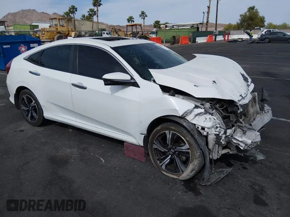 ✅ 2016 Honda Civic Touring • VIN: 19XFC1F97GE209928 • Lot: 44885608. Listed on IAAI with 142,007 mi. Free auction sales archive from the USA and detailed vehicle history report at DreamBid. Image 1.