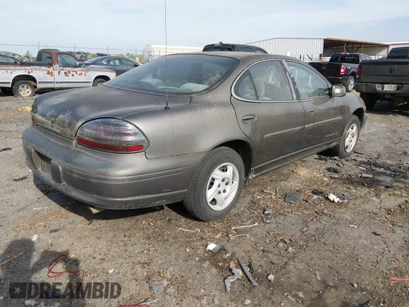 ✅ 2000 Pontiac Grand Prix • VIN: 1G2WJ52J8YF265207 • Лот: 44695146. Опубліковано раніше на IAAI з пробігом 269 334 миль. Безкоштовний доступ до архіву аукціонних продажів зі США та докладний звіт про історію автомобіля на DreamBid. Зображення 4.