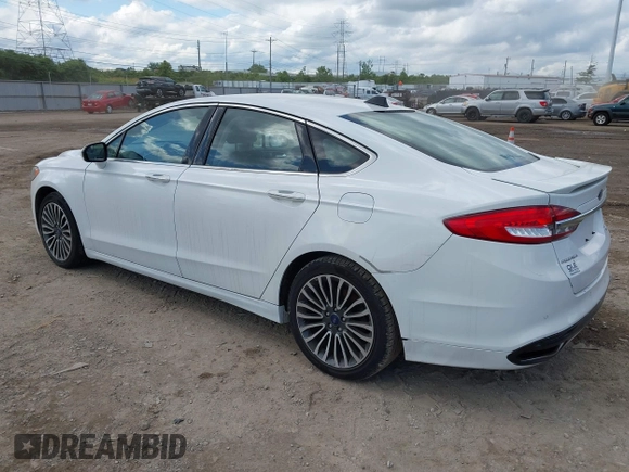 ✅ 2017 Ford Fusion Titanium • VIN: 3FA6P0K91HR182813 • Лот: 45012921. Опубликован ранее на IAAI с пробегом 127 667 миль. Бесплатный доступ к архиву аукционных продаж из США и подробный отчёт об истории автомобиля на DreamBid. Изображение 3.