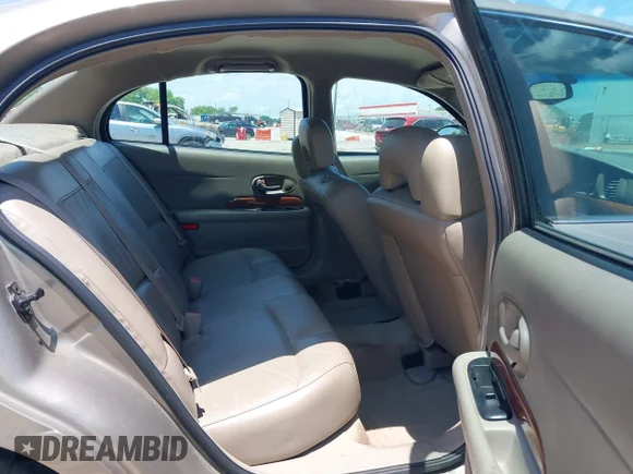 ✅ 2003 Buick LeSabre Custom • VIN: 1G4HP52K134172623 • Лот: 42298046. Опубліковано раніше на IAAI з пробігом 70 152 миль. Безкоштовний доступ до архіву аукціонних продажів зі США та докладний звіт про історію автомобіля на DreamBid. Зображення 8.