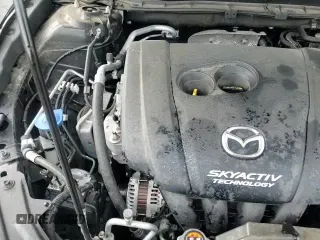 ✅ 2018 Mazda 3 Touring • VIN: 3MZBN1L37JM275284 • Лот: 91773815. Опубликован ранее на Copart с пробегом 56 186 миль. Бесплатный доступ к архиву аукционных продаж из США и подробный отчёт об истории автомобиля на DreamBid. Изображение 15.