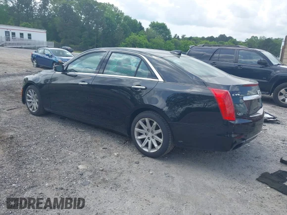 ✅ 2016 Cadillac CTS RWD • VIN: 1G6AP5SX0G0118831 • Lot: 42105091. Listed on IAAI with 123,507 mi. Free auction sales archive from the USA and detailed vehicle history report at DreamBid. Image 3.