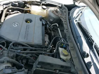 ✅ 2012 Mazda 3 i Touring • VIN: JM1BL1VG8C1511935 • Lot: 42133682. Wystawiony na IAAI z przebiegiem 212 568 mil. Bezpłatny archiwum sprzedaży aukcyjnych z USA i szczegółowy raport historii pojazdu na DreamBid. Zdjęcie 14.