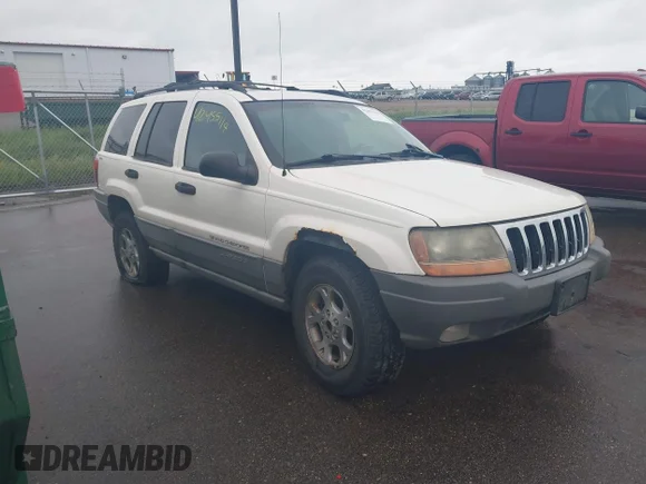 ✅ 2000 Jeep Grand Cherokee Laredo • VIN: 1J4GW48S4YC279502 • Лот: 42455119. Опубликован ранее на IAAI с пробегом 161 984 миль. Бесплатный доступ к архиву аукционных продаж из США и подробный отчёт об истории автомобиля на DreamBid. Изображение 1.