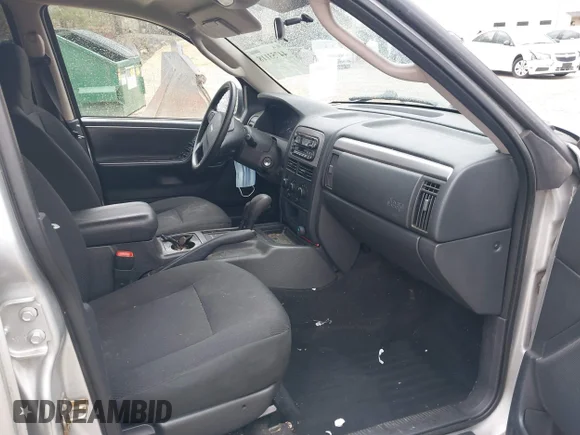 ✅ 2004 Jeep Grand Cherokee Laredo • VIN: 1J4GW48S94C275682 • Lot: 44753118. Wystawiony na IAAI z przebiegiem 156 533 mil. Bezpłatny archiwum sprzedaży aukcyjnych z USA i szczegółowy raport historii pojazdu na DreamBid. Zdjęcie 5.