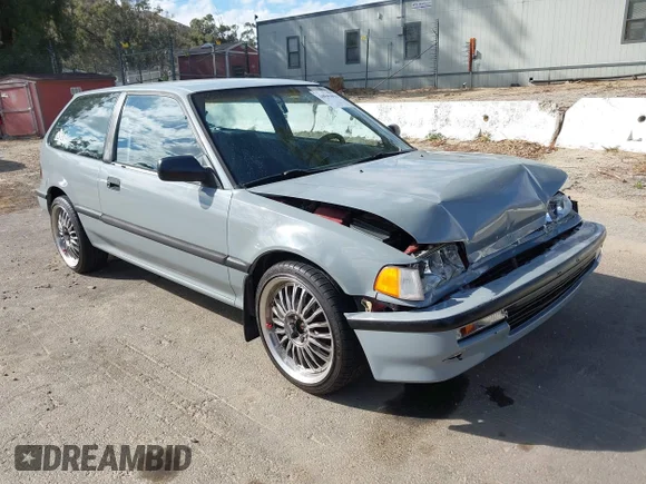 ✅ 1991 Honda Civic DX • VIN: 2HGED6451MH585449 • Lot: 44843094. Listed on IAAI with 166,857 mi. Free auction sales archive from the USA and detailed vehicle history report at DreamBid. Image 1.