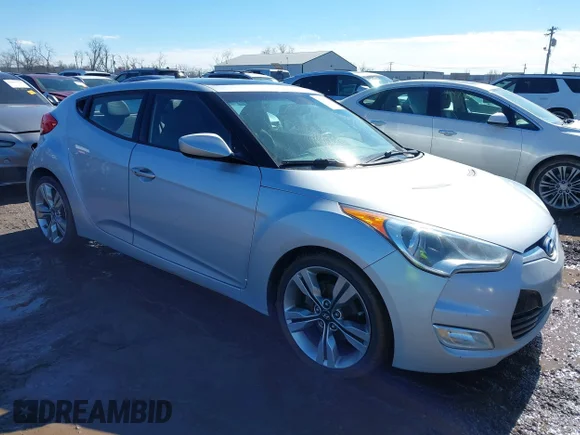 ✅ 2012 Hyundai Veloster w/Gray Int • VIN: KMHTC6AD7CU031733 • Lot: 44483540. Wystawiony na IAAI z przebiegiem 123 789 mil. Bezpłatny archiwum sprzedaży aukcyjnych z USA i szczegółowy raport historii pojazdu na DreamBid. Zdjęcie 1.