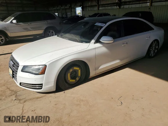 ✅ 2011 Audi A8 • VIN: WAURVAFD7BN028177 • Лот: 55617506. Опубликован ранее на Copart с пробегом 112 518 миль. Бесплатный доступ к архиву аукционных продаж из США и подробный отчёт об истории автомобиля на DreamBid. Изображение 1.