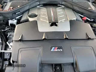 ✅ 2013 BMW X5 M • VIN: 5YMGY0C52D0C11599 • Лот: 87298714. Опубликован ранее на Copart с пробегом 136 849 миль. Бесплатный доступ к архиву аукционных продаж из США и подробный отчёт об истории автомобиля на DreamBid. Изображение 13.