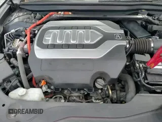 ✅ 2018 Acura RLX Hybrid Sport • VIN: JH4KC2F91JC000122 • Лот: 69392385. Опубликован ранее на Copart с пробегом 74 797 миль. Бесплатный доступ к архиву аукционных продаж из США и подробный отчёт об истории автомобиля на DreamBid. Изображение 13.