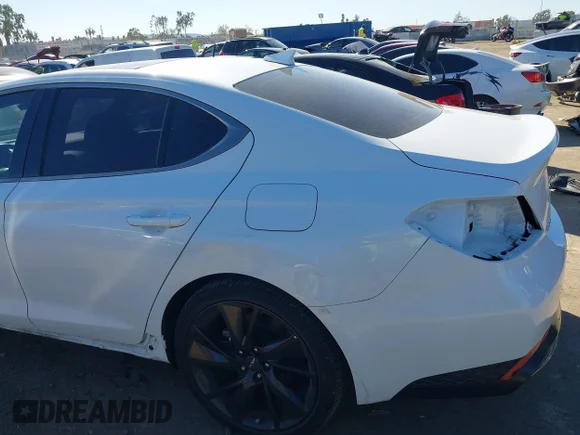 ✅ 2023 Genesis G70 2.0T • VIN: KMTG34TA8PU134115 • Lot: 43422006. Wystawiony na IAAI z przebiegiem 18 688 mil. Bezpłatny archiwum sprzedaży aukcyjnych z USA i szczegółowy raport historii pojazdu na DreamBid. Zdjęcie 6.