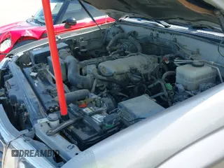 ✅ 2003 Toyota Land Cruiser • VIN: JTEHT05J332047202 • Lot: 42642004. Wystawiony na IAAI z przebiegiem 282 640 mil. Bezpłatny archiwum sprzedaży aukcyjnych z USA i szczegółowy raport historii pojazdu na DreamBid. Zdjęcie 20.