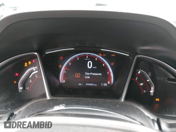 ✅ 2020 Honda Civic Sport • VIN: 19XFC2F83LE007031 • Lot: 44989729. Wystawiony na IAAI z przebiegiem 70 409 mil. Bezpłatny archiwum sprzedaży aukcyjnych z USA i szczegółowy raport historii pojazdu na DreamBid. Zdjęcie 7.