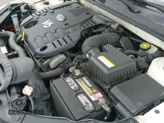 ✅ 2007 Kia Optima EX • VIN: KNAGE124X75155428 • Lot: 42113607. Wystawiony na IAAI z przebiegiem 69 522 mil. Bezpłatny archiwum sprzedaży aukcyjnych z USA i szczegółowy raport historii pojazdu na DreamBid. Zdjęcie 21.