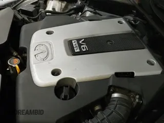 ✅ 2014 Infiniti Q50 Premium • VIN: JN1BV7AP4EM670412 • Лот: 43453719. Опубликован ранее на IAAI с пробегом 256 702 миль. Бесплатный доступ к архиву аукционных продаж из США и подробный отчёт об истории автомобиля на DreamBid. Изображение 12.