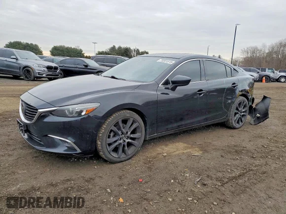 ✅ 2016 Mazda 6 i Grand Touring • VIN: JM1GJ1W57G1400694 • Лот: 73201515. Опубликован ранее на Copart с пробегом 149 730 миль. Бесплатный доступ к архиву аукционных продаж из США и подробный отчёт об истории автомобиля на DreamBid. Изображение 1.