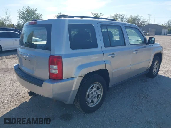 ✅ 2010 Jeep Patriot Sport • VIN: 1J4NF2GB3AD658164 • Лот: 43335195. Опубликован ранее на IAAI с пробегом 133 322 миль. Бесплатный доступ к архиву аукционных продаж из США и подробный отчёт об истории автомобиля на DreamBid. Изображение 4.