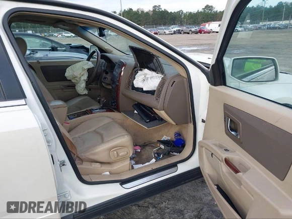 ✅ 2006 Cadillac SRX • VIN: 1GYEE637060219630 • Lot: 39922243. Listed on IAAI with 197,302 mi. Free auction sales archive from the USA and detailed vehicle history report at DreamBid. Image 5.