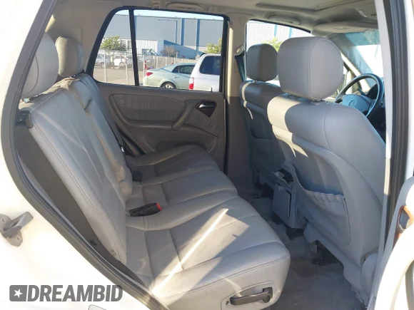 ✅ 2000 Mercedes-Benz M 320/430/500 • VIN: 4JGAB54E3YA145312 • Лот: 41332155. Опубліковано раніше на IAAI з пробігом 128 217 миль. Безкоштовний доступ до архіву аукціонних продажів зі США та докладний звіт про історію автомобіля на DreamBid. Зображення 8.
