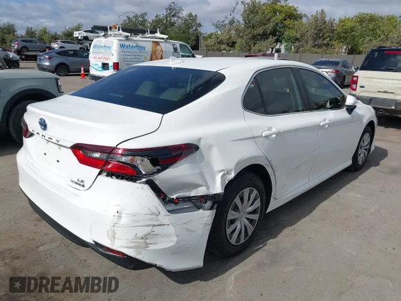 ✅ 2022 Toyota Camry Hybrid LE • VIN: 4T1C31AK5NU570713 • Lot: 45202013. Wystawiony na IAAI z przebiegiem 64 360 mil. Bezpłatny archiwum sprzedaży aukcyjnych z USA i szczegółowy raport historii pojazdu na DreamBid. Zdjęcie 6.