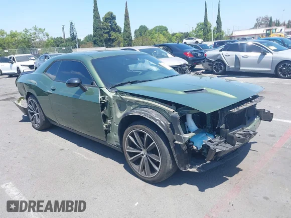 ✅ 2022 Dodge Challenger SXT • VIN: 2C3CDZAG2NH212066 • Лот: 42394709. Опубліковано раніше на IAAI з пробігом 26 347 миль. Безкоштовний доступ до архіву аукціонних продажів зі США та докладний звіт про історію автомобіля на DreamBid. Зображення 1.