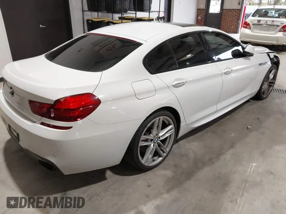 ✅ 2014 BMW 6 Series 650i • VIN: WBA6B2C58ED129009 • Lot: 43546135. Listed on IAAI with 123,509 mi. Free auction sales archive from the USA and detailed vehicle history report at DreamBid. Image 4.