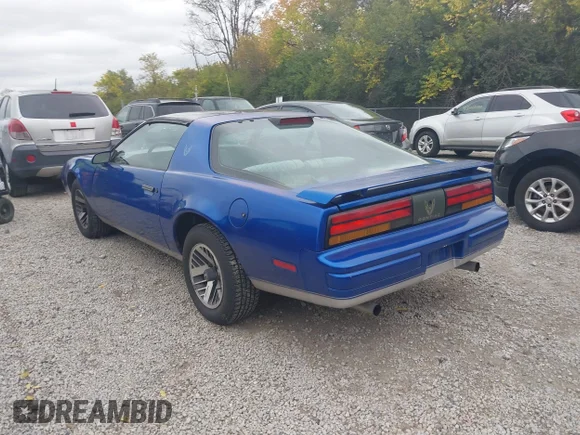 ✅ 1986 Pontiac Firebird • VIN: 1G2FS87S0GN229113 • Лот: 43511251. Опубліковано раніше на IAAI з пробігом 124 185 миль. Безкоштовний доступ до архіву аукціонних продажів зі США та докладний звіт про історію автомобіля на DreamBid. Зображення 3.