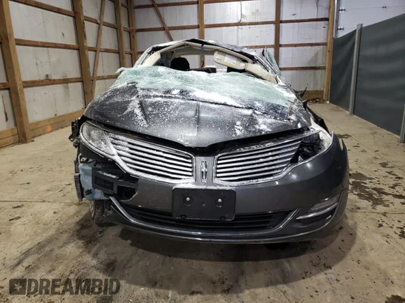 ✅ 2015 Lincoln MKZ • VIN: 3LN6L2JK7FR605151 • Lot: 83638324. Wystawiony na Copart z przebiegiem 120 179 mil. Bezpłatny archiwum sprzedaży aukcyjnych z USA i szczegółowy raport historii pojazdu na DreamBid. Zdjęcie 5.