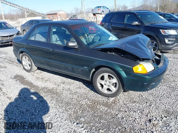 ✅ 1999 Mazda Protege ES • VIN: JM1BJ2218X0117715 • Lot: 44328968. Listed on IAAI with 165,507 mi. Free auction sales archive from the USA and detailed vehicle history report at DreamBid. Image 1.
